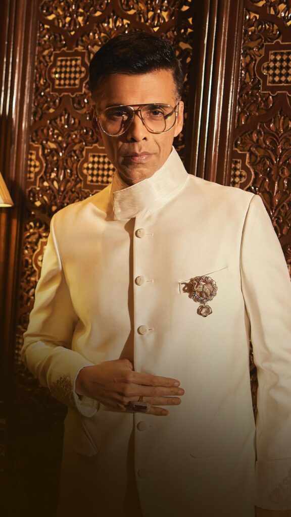 Karan Johar in Manish malhotra brooch